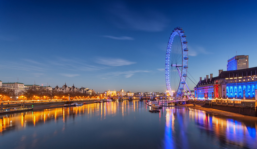 River Thames and London Eye lit up at night
