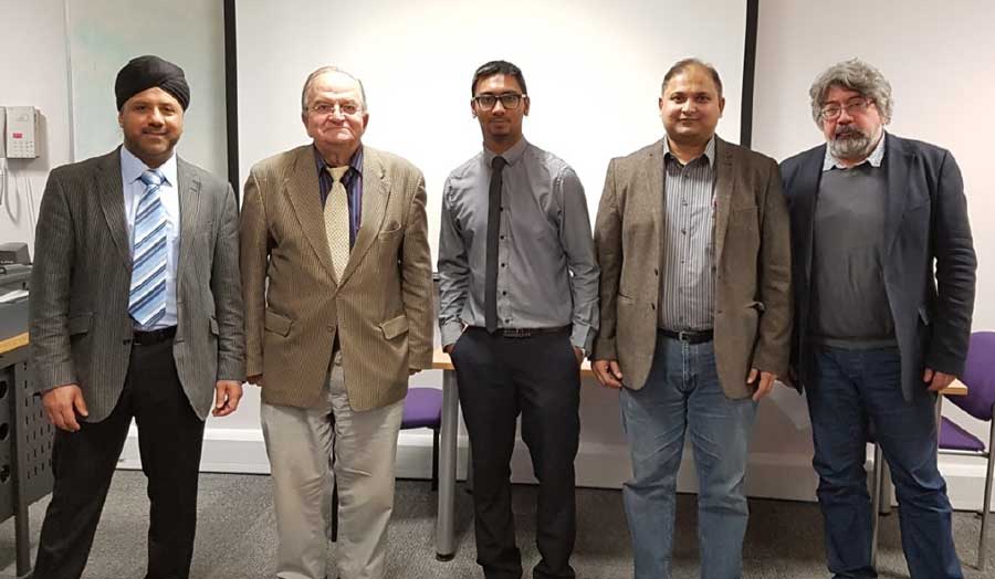 4 academics and PhD student Leckhun Kumar Mewhoor after he successfully defended his PhD
