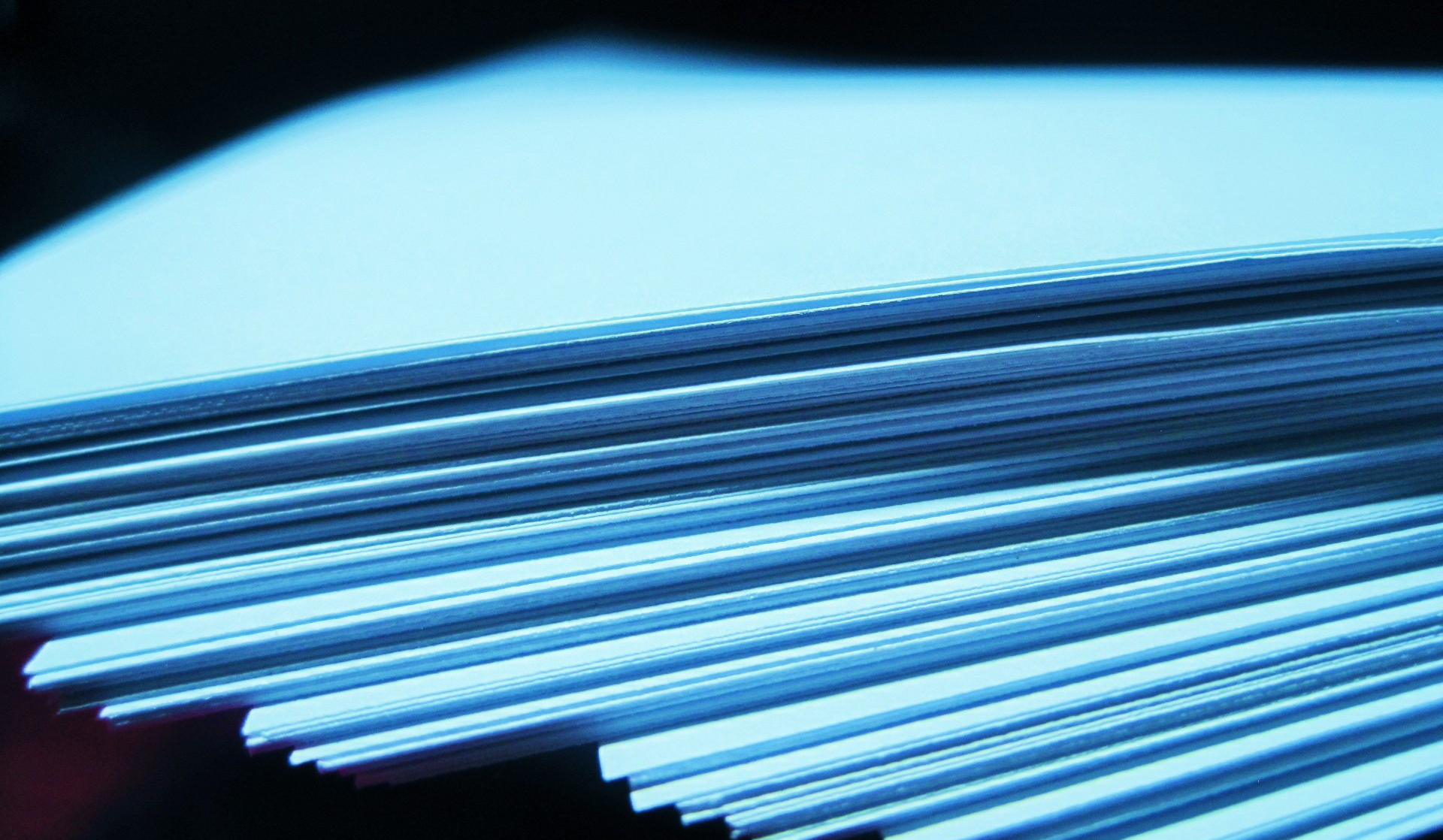 A stack of papers representing the journal 'Interpreting'