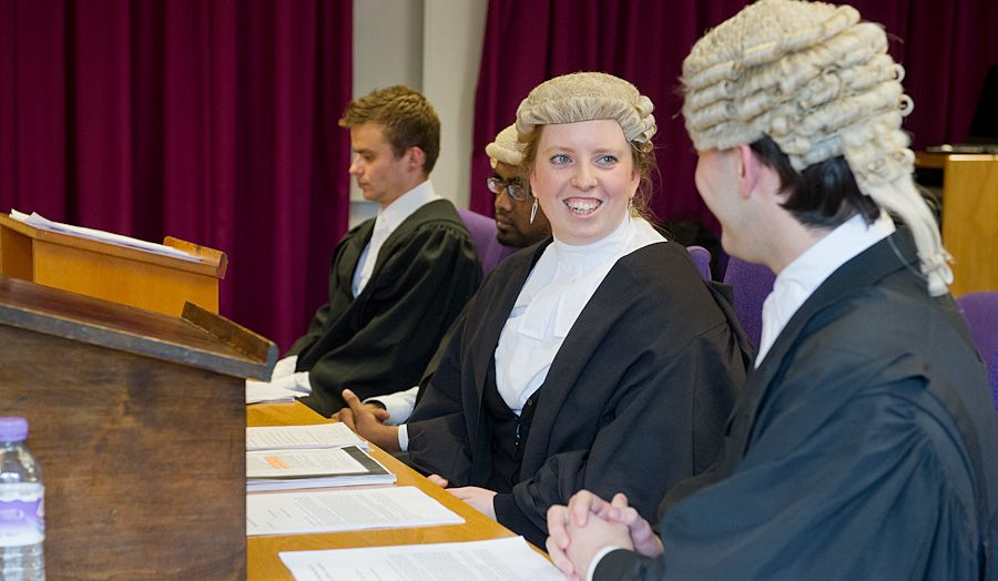 Image of two people in a courtroom