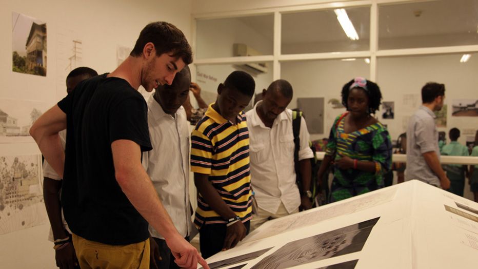 LMU students discuss drawings Freetown