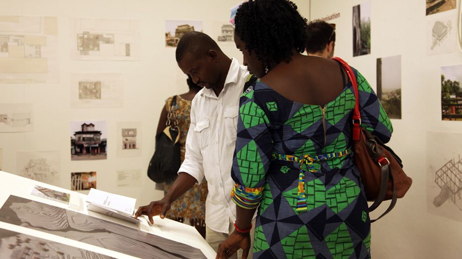Visitors looking through research Freetown