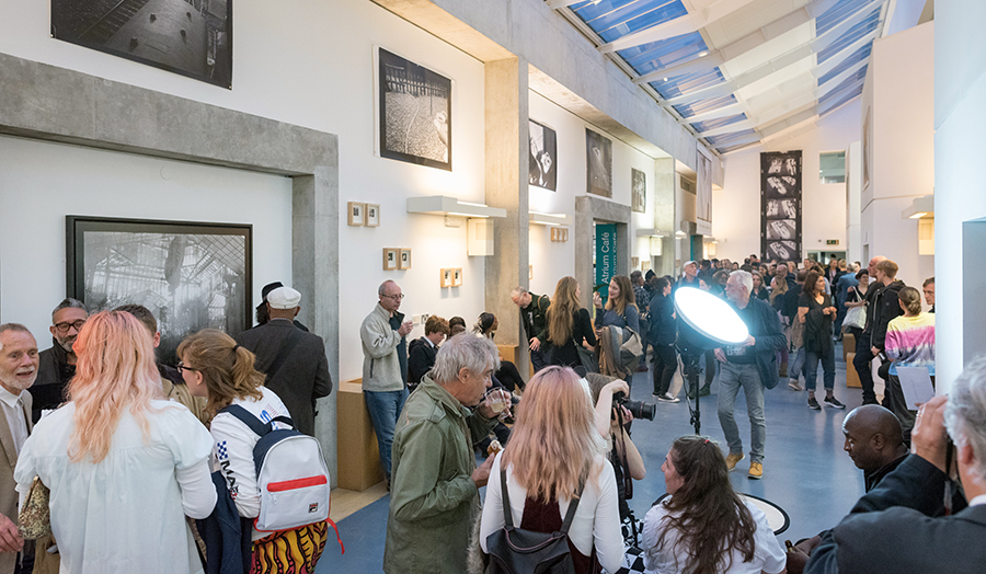 Students, public and artists gathered in the Atrium for a private art viewing at The Cass