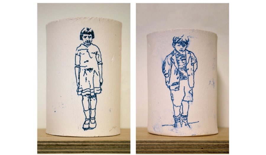 two ceramic containers illustrated with prints of children