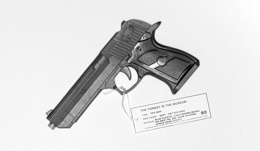 A gun with a label