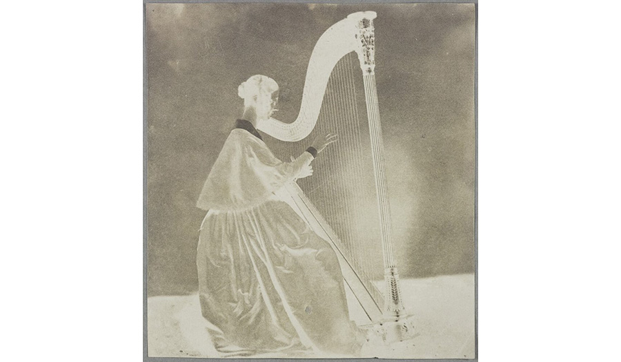 Horatia playing Amelina's harp (neg, reversed) from the Science Museum