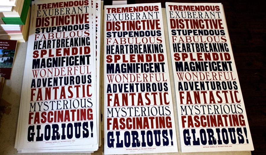 Posters listing positive words such as Exuberant, Magnificent and Distinctive in different typefaces