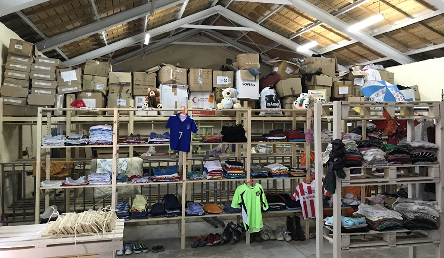 Shed full of donated clothes in Malakasa refugee camp, Athens
