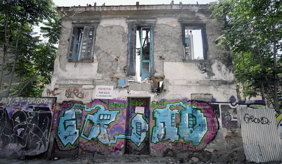 Photograph of a historic ruined building for sale covered with graffiti [Robert Barnes]