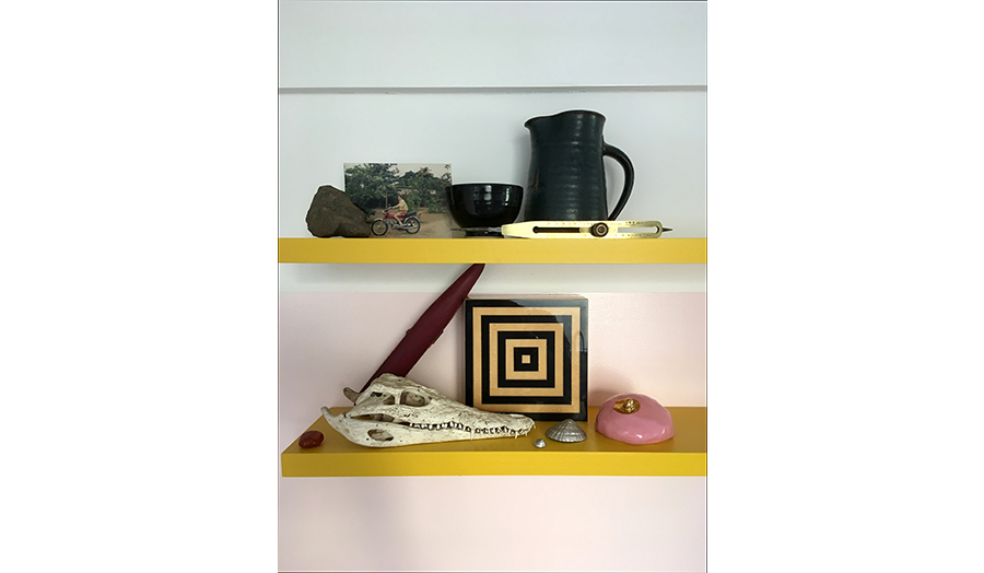 A diverse collection of objects on shelving to represent Studio 03