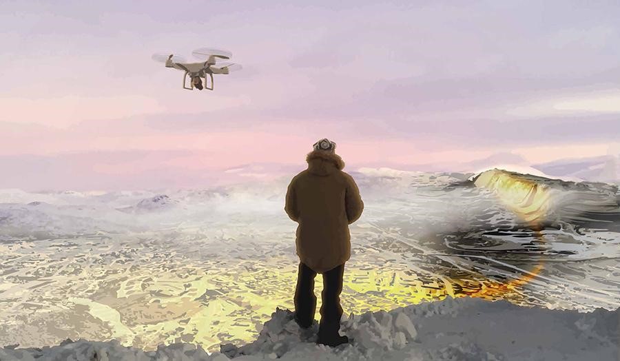 Man in winter clothing controlling a drone at edge of icy lake