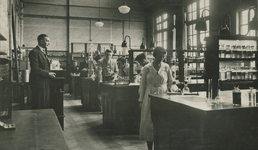 An old photo of students in a science lab