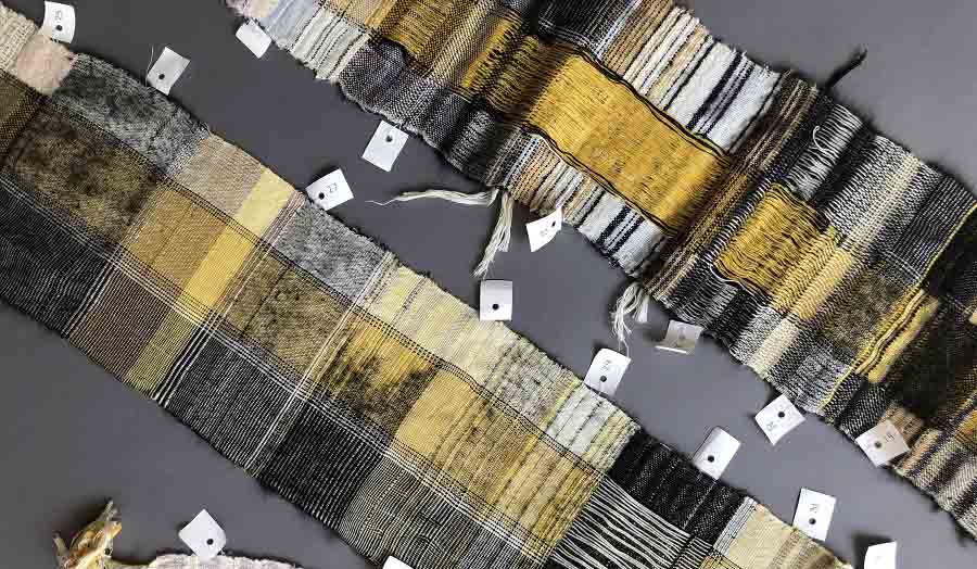 Strips of Yellow and black textiles 