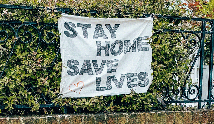 A banner reading 'Stay home, save lives'