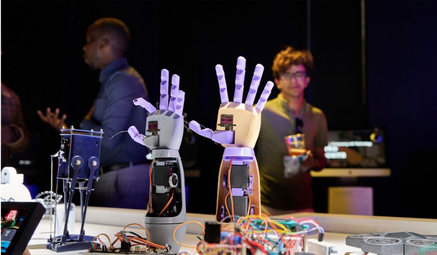 A pair of robotic hands at a student show