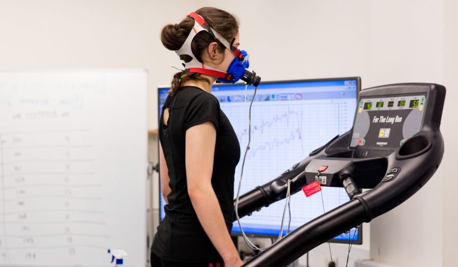 Image of a person on a treadmill with breathing equipment