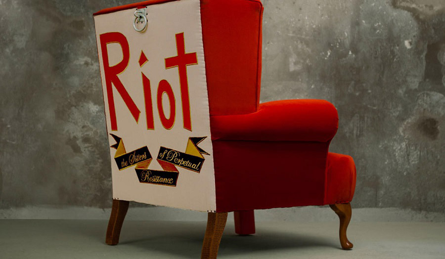 A red chair with a placard saying 