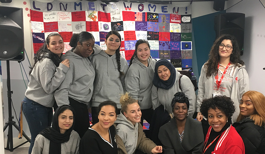 Group photo of female students celebrating International Women's Day