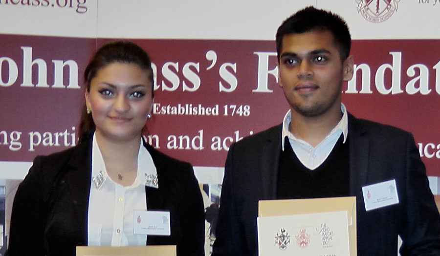 Sabah Ayaz and Mujakkir Ahmed receiving their awards