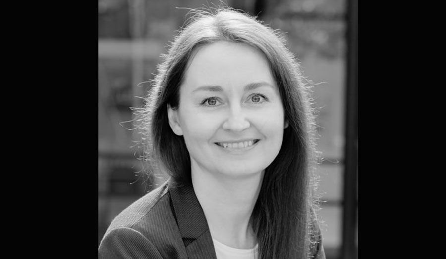 a black and white portrait of Dr Sylwia Ciuk