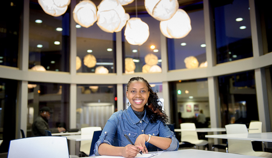 A female student completes a form