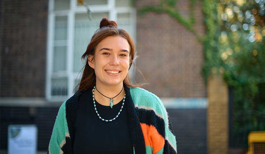Lucy Simpson photographed smiling outside Holloway Road campus