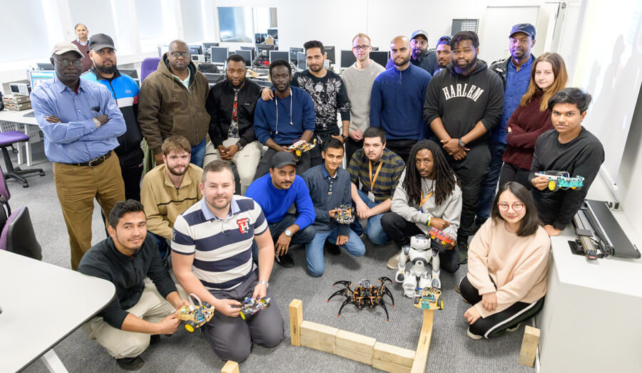 Group of students with their robots