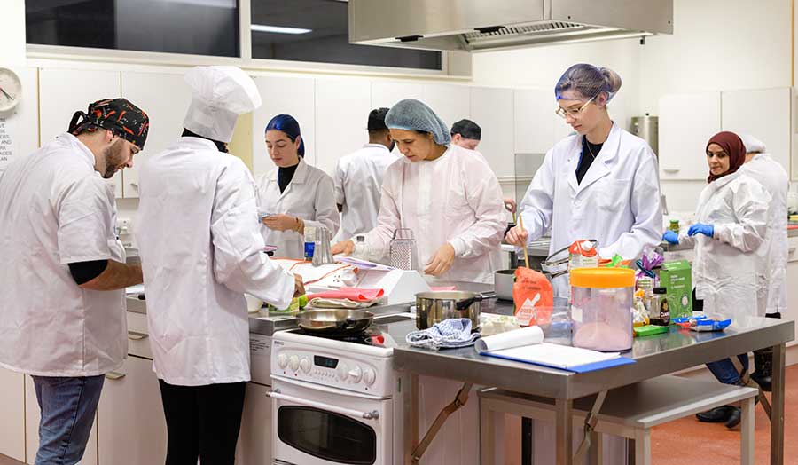 students in the professional kitchen