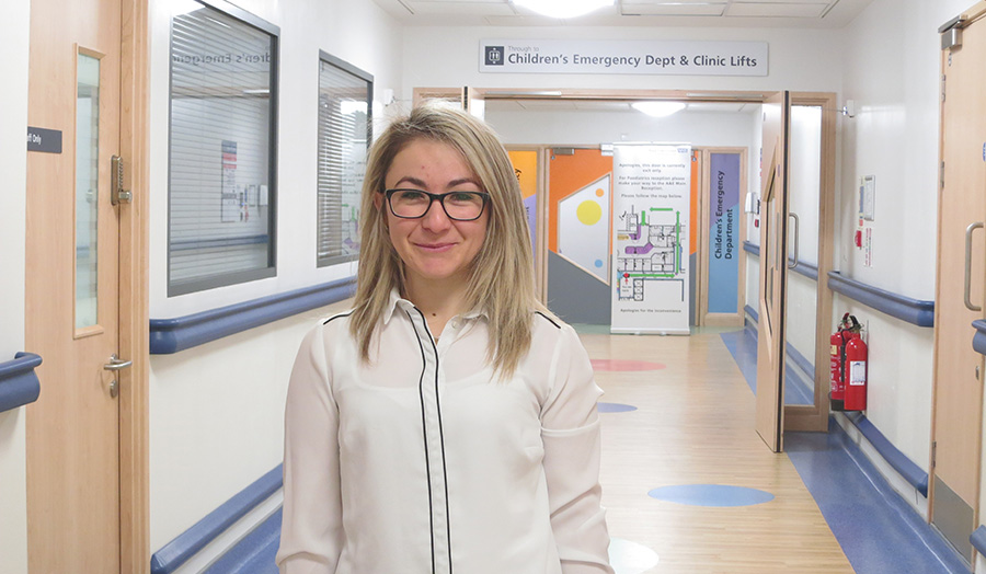 A photograph of Oltjana, a refugee nurse.