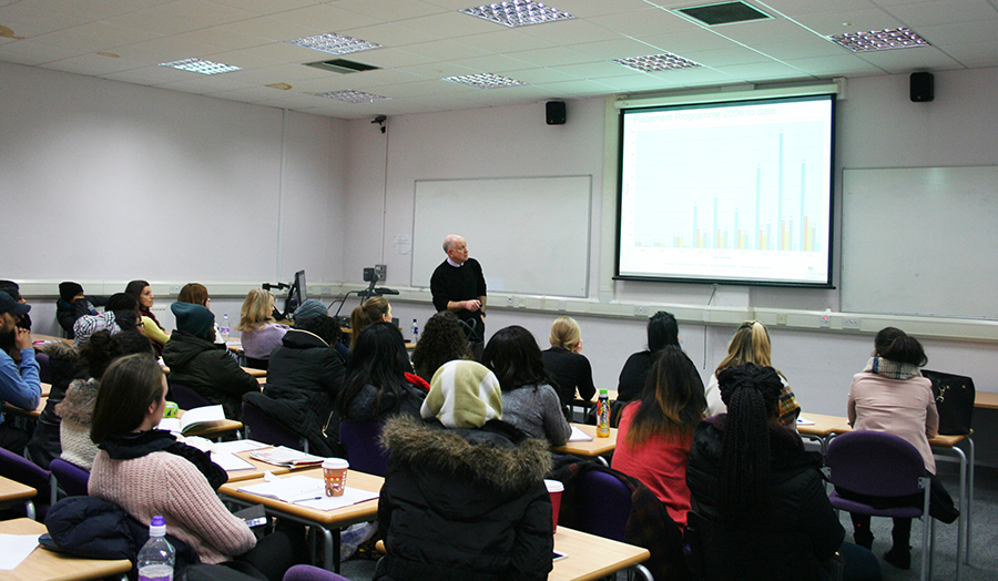 Dr Mike Carter gives an engaging talk to a full room of students on how to be a biomedical scientist