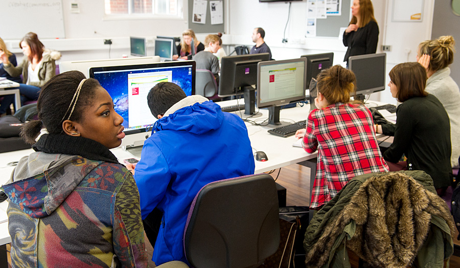 Students in newsroom