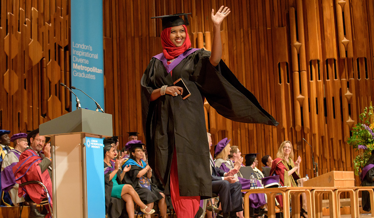 Saadiyo Abdi with her award for academic excellence.