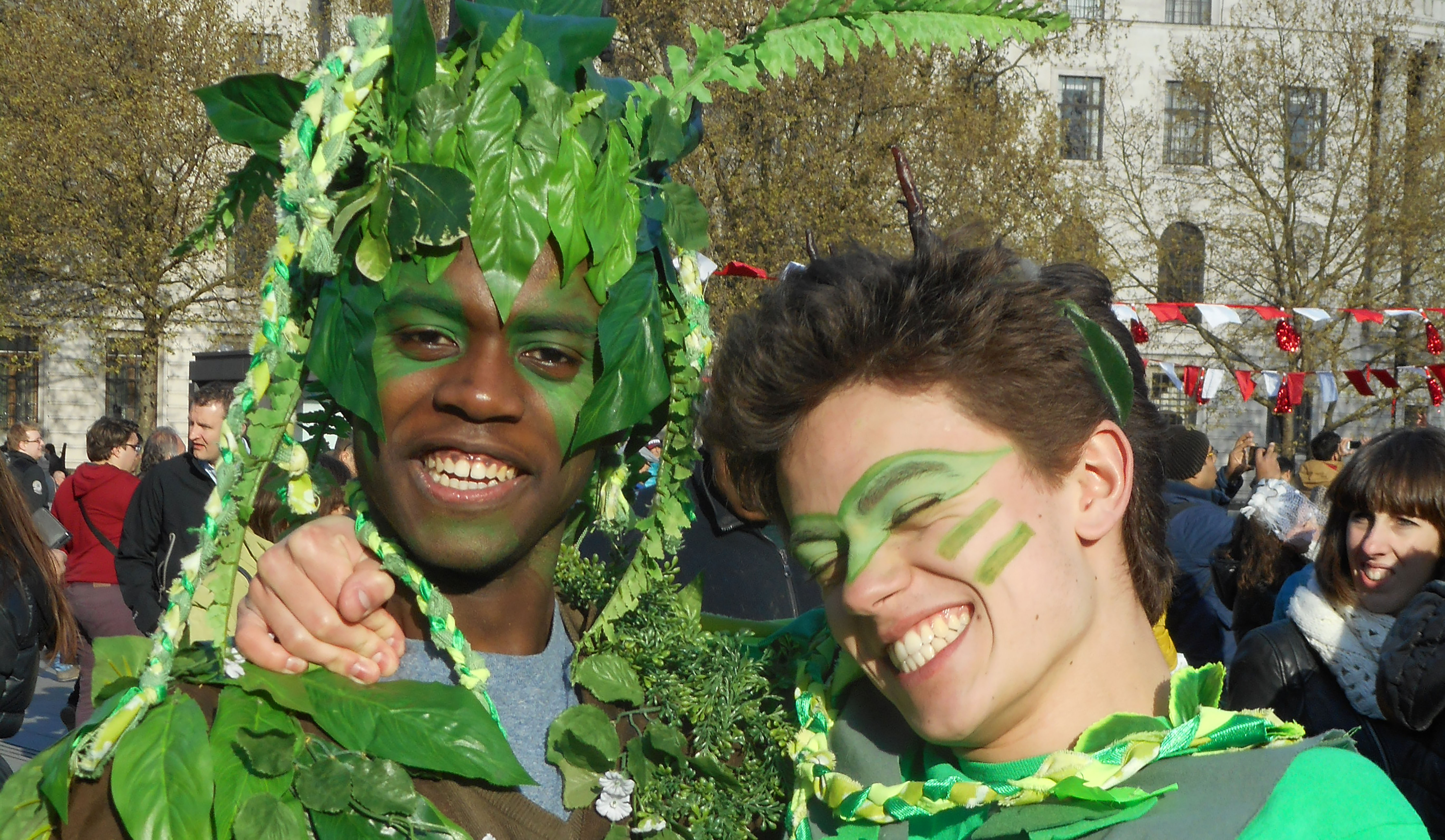 students dressed as a tree and a dragon