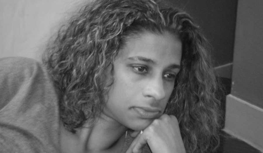 a black and white profile photo of Christina Arnephie