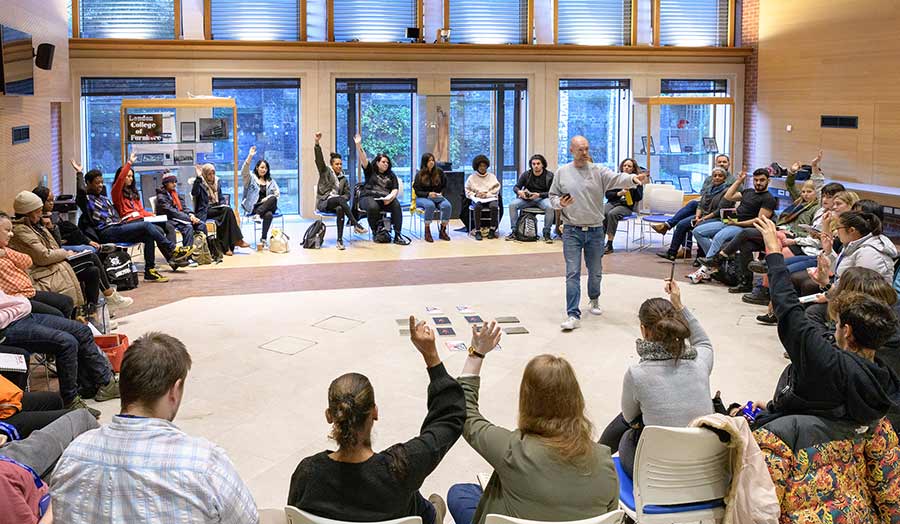 A writing workshop where students sit in a large circle
