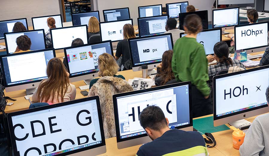 Students in a computer lab doing a typography workshop