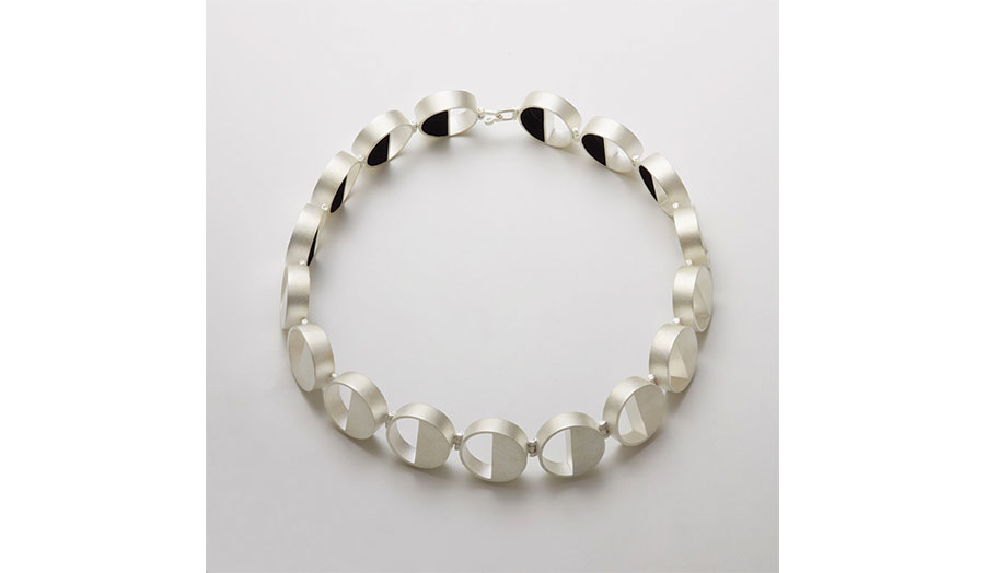 Half-moon necklace in silver, by Mara Irsara
