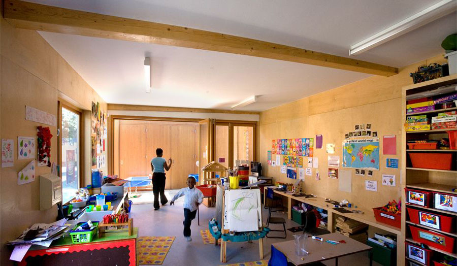 Teacher and child in new classroom