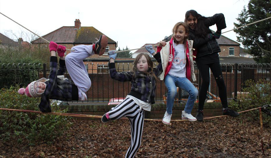 Children playing in hayes