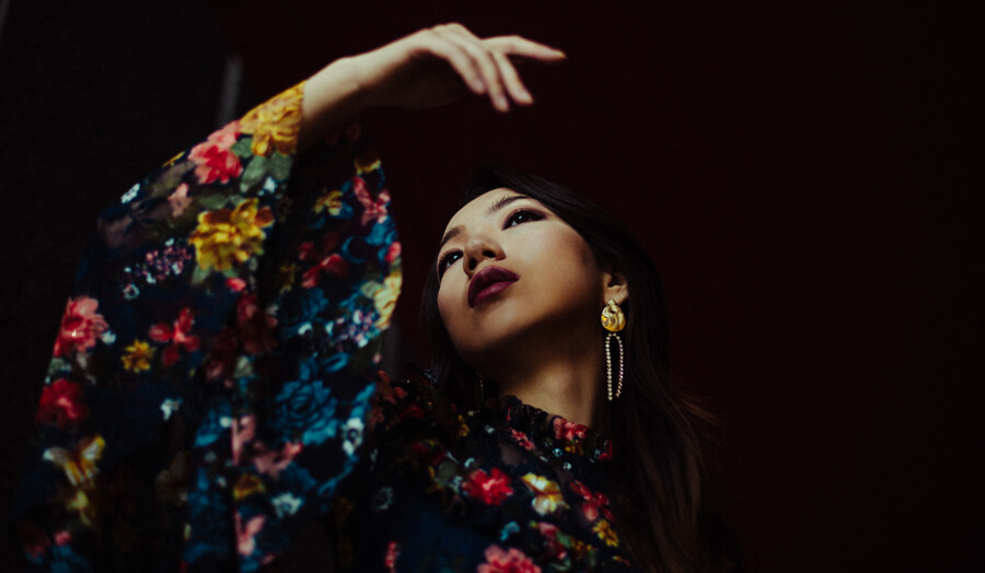 Girl in patterned blouse