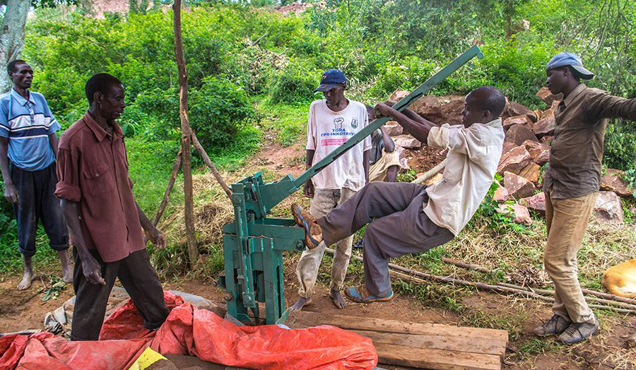 The coop now trained in making compressed earth blocks (CEB)