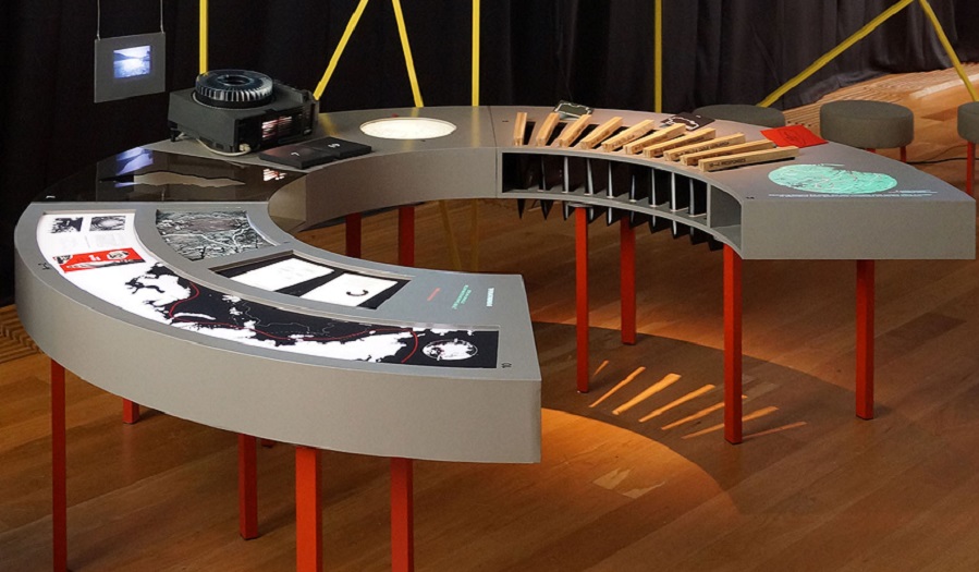 Work arranged in a circular table display for oslo exhibition