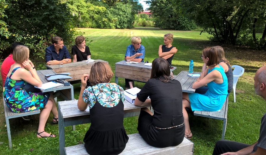 Staff from Londonmet and Hasselt have an informal meeting outdoors