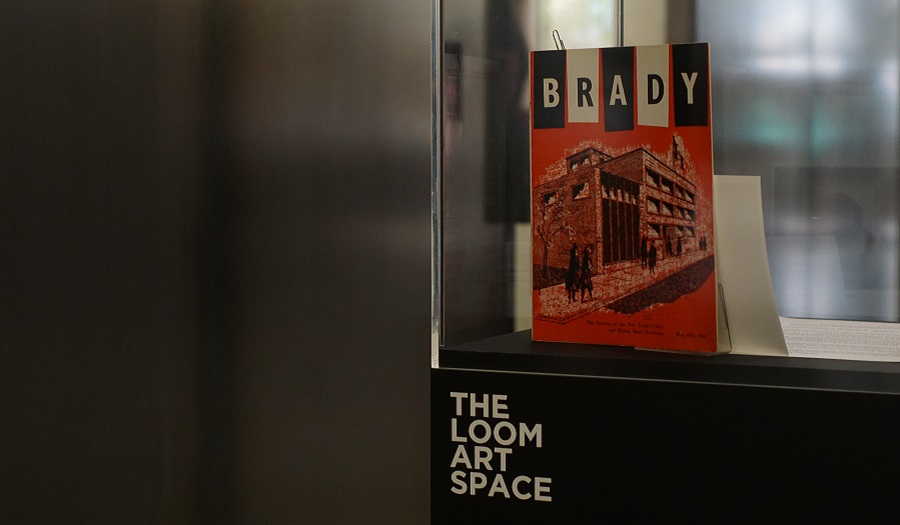 display cabinet at loom showing words the brady club