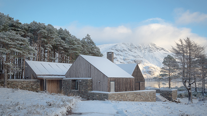 a house in a snowy landscape