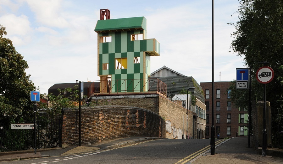 image of colourful structure on urban rooftop