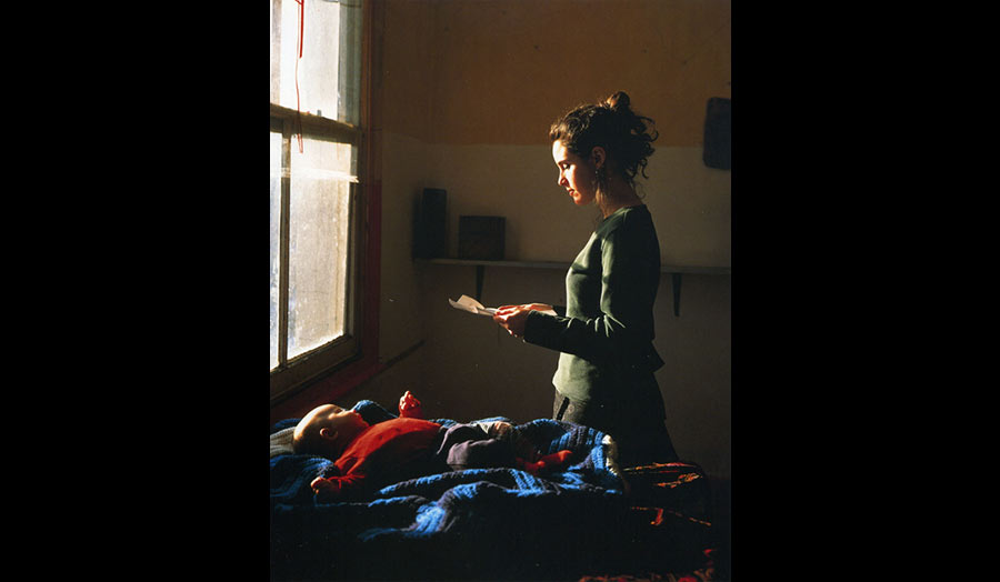 Woman Reading a Possession Order