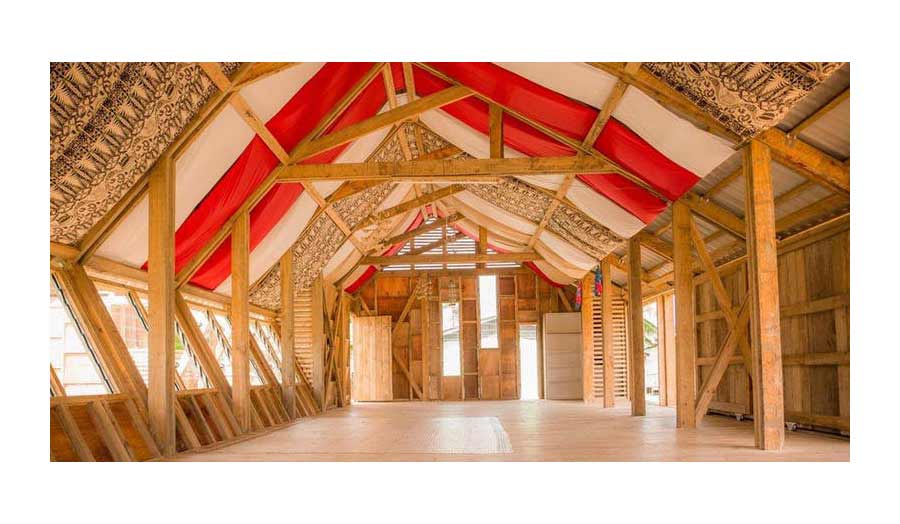 A view of a large room of a wooden construction