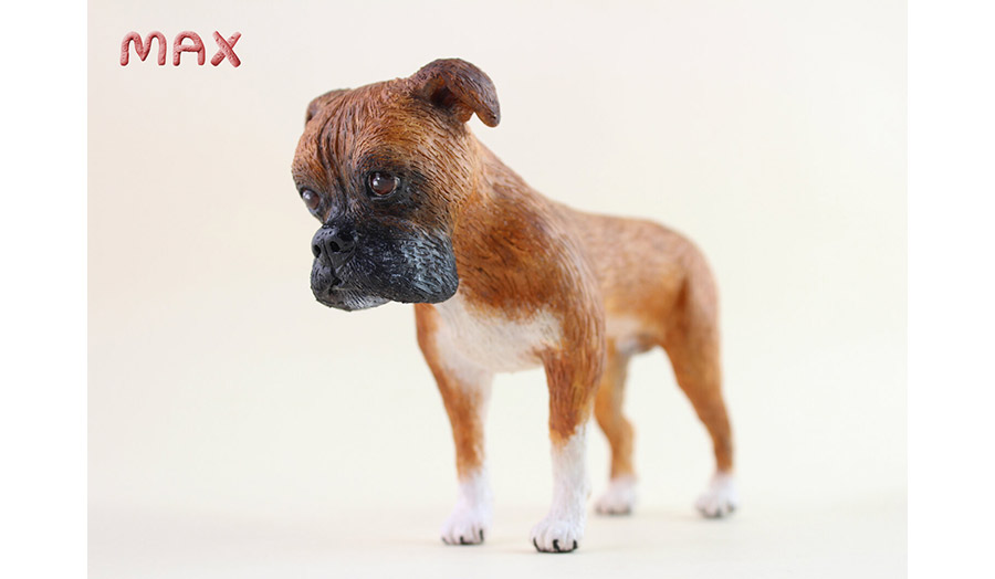 A hand-made personalised dog figurine created using oven-bake clay and painted with acrylics