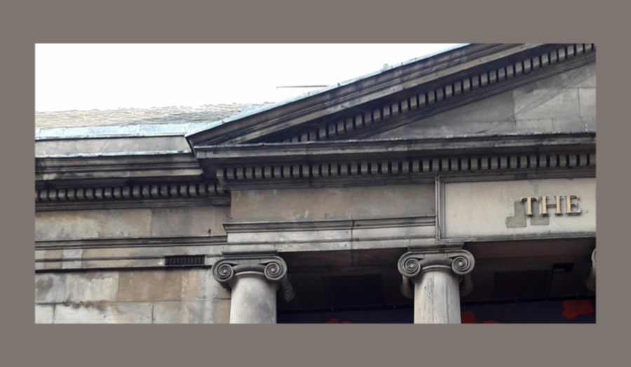 Close view of the upper part of the facade of the Old Lyceum, Liverpool